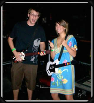 guitar hero party tulsa guy and girl playing guitar hero in wichita ks